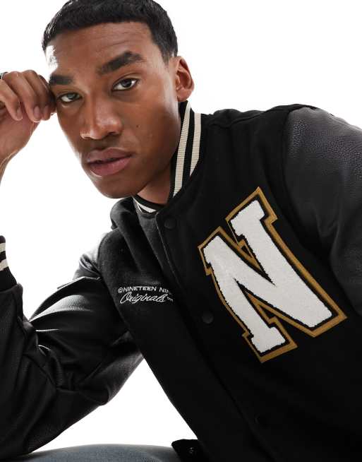 Black and shop gold varsity jacket