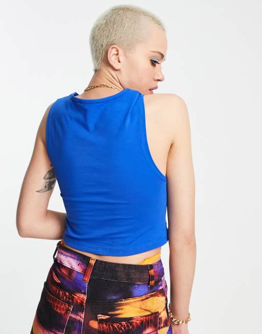 Jaded London cropped vest with front slash cut outs in blue | ASOS