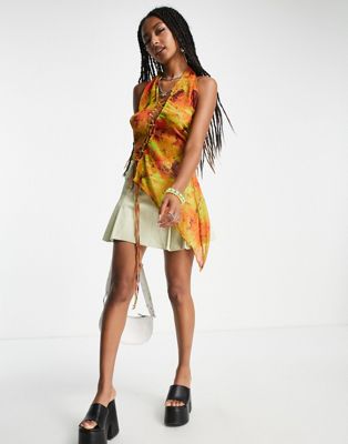 Jaded London halter neck asymmetric top with lace up front in multi spring print