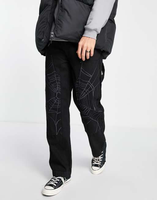 Jaded London - Jeans met rechte pijpen in zwart met panelen met spinnenwebprint