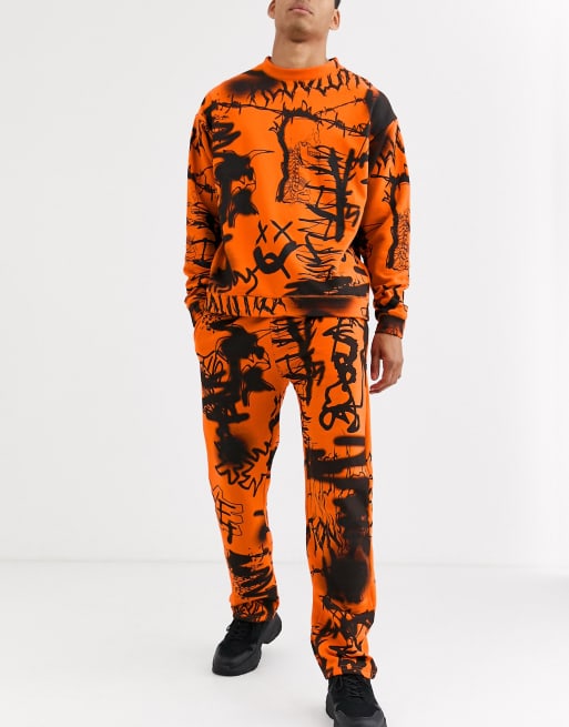 Jaded London - Trainingspak met graffiti-print in oranje, 3 van 3