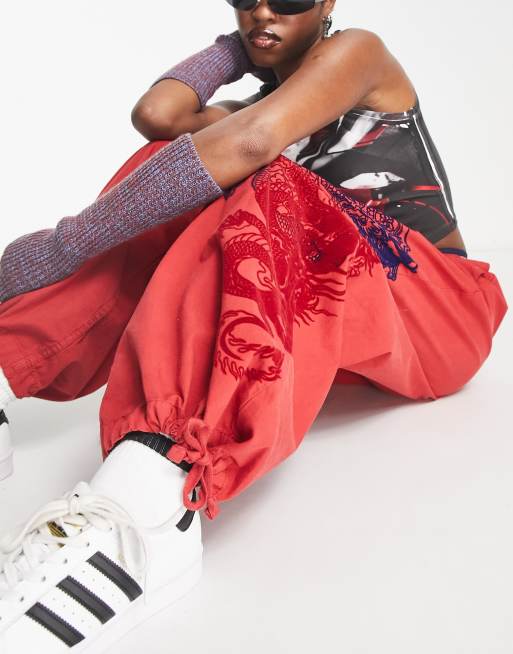 Jaded London low rise parachute pants with flocking in red, 3 of 4