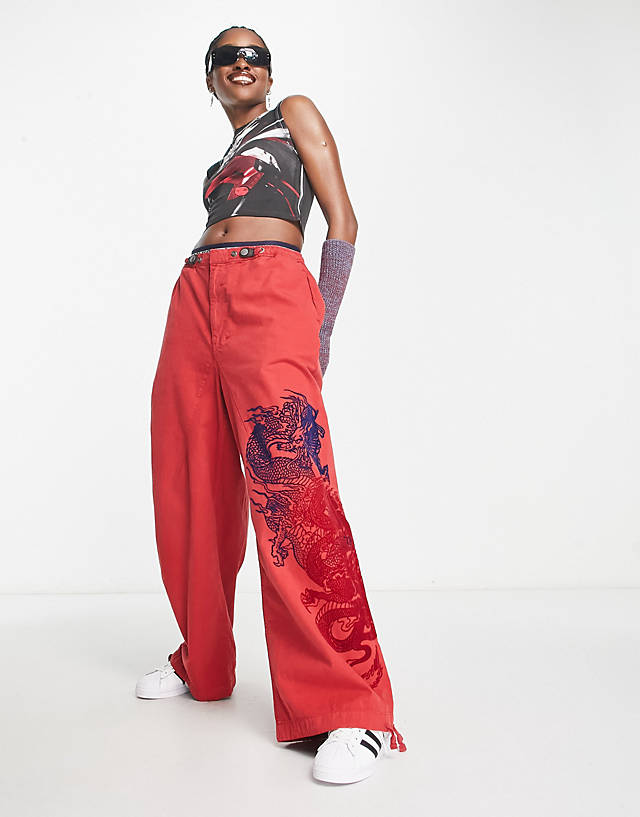 Jaded London - low rise parachute trousers with flocking in red