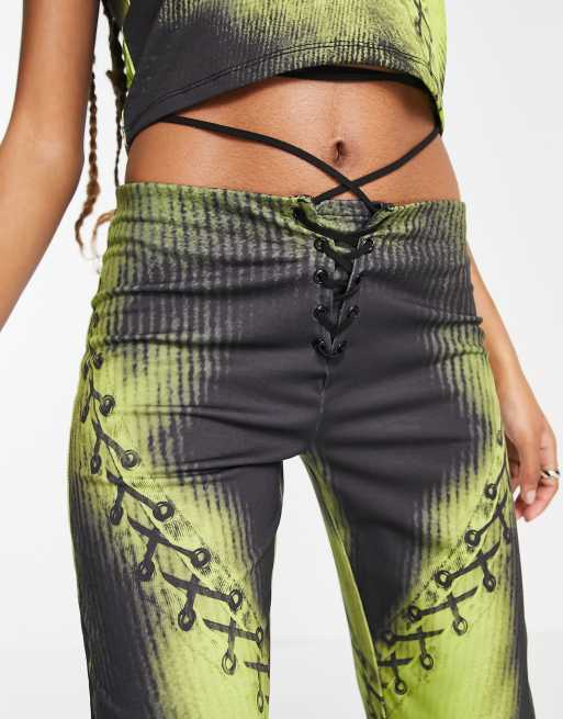 Jaded London low waist tie detail trousers in illusion print