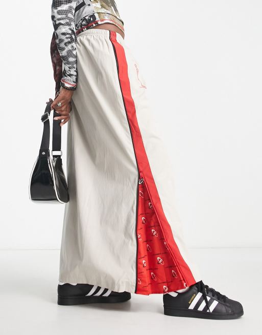 Jaded London maxi cargo skirt with sporty graphics in beige ASOS