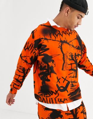 Jaded London – Orange sweatshirt med graffitimönster