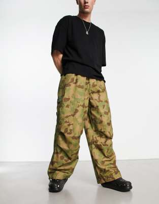 Jaded London oversized camo parachute cargo pants in khaki-Multi