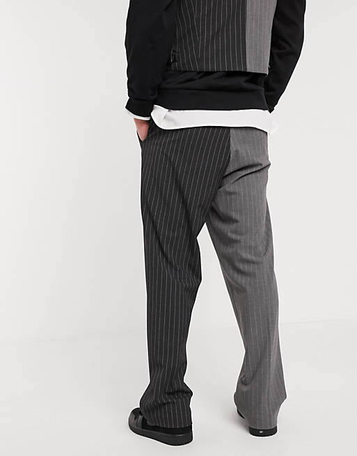 Jaded London spliced pinstripe loose fit pants in black and gray