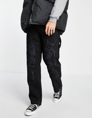Jaded London straight leg jeans in black with spider web panel print