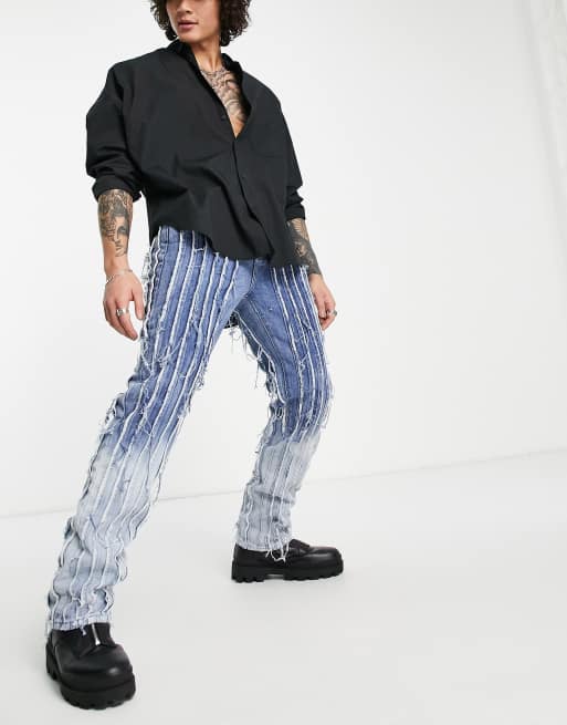 Jaded London straight leg jeans in faded blue with frayed panels 