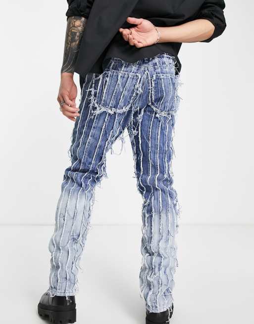 Jaded London straight leg jeans in faded blue with frayed panels 