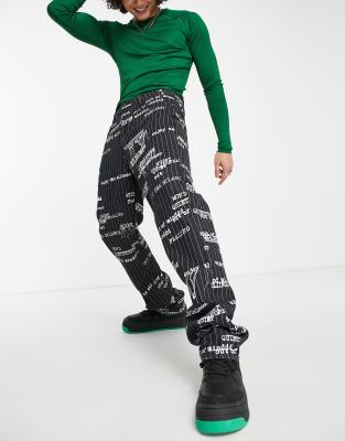 Jaded London straight leg jeans in washed black with pinstripe and typewriter all over print