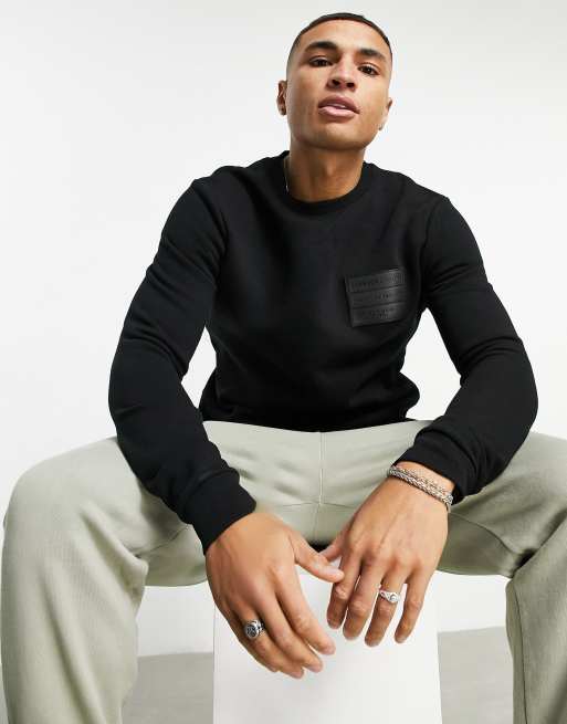 Jameson Carter leighton leather patch sweatshirt in black | ASOS