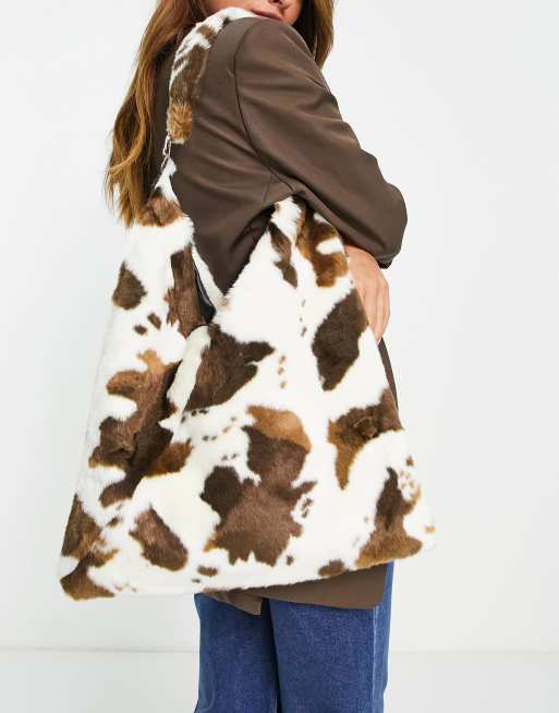 Cow print sales fur bag