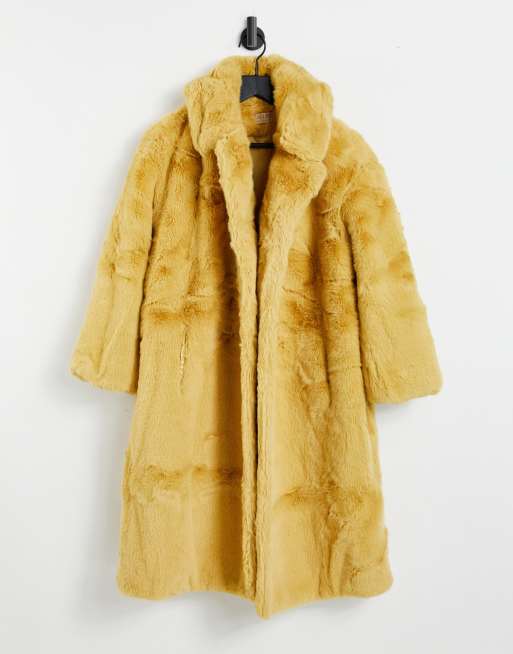 manteau fausse fourrure jaune