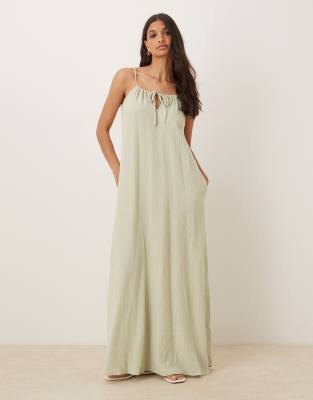 Thumbnail - JDY - Ärmelloses Maxikleid aus grob gewebter Baumwolle in Salbeigrün mit Bindedetail vorn