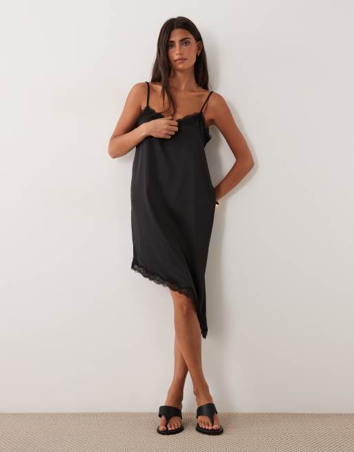 lois mini dress in ivory Liliane Suiting / | MESHKI SEA PRINCESS- Our beautiful complete_anne-cole-twist-front-shirred-one-piece-4 The fully lined construction Color:Black Onyx