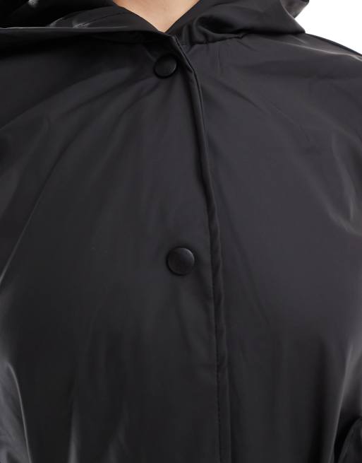 JDY belted raincoat with hood in black