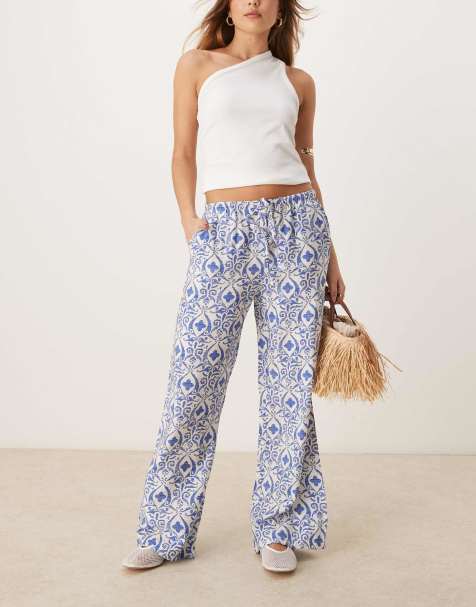 JDY - Broek met wijde pijpen en gestrikte taille in blauwe tegelprint - view 1