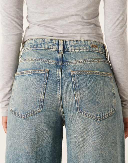 JDY Carina wide leg jeans with asymmetric seams in medium blue wash, 4 of 5