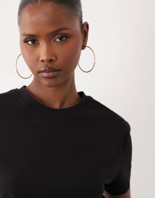 Jdy Drop Shoulder Asymmetric Top In Black
