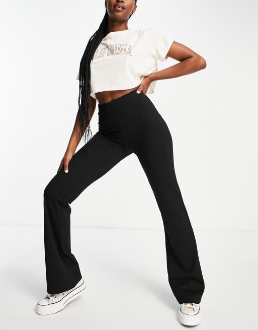 Bershka folded waistband flared pants in black