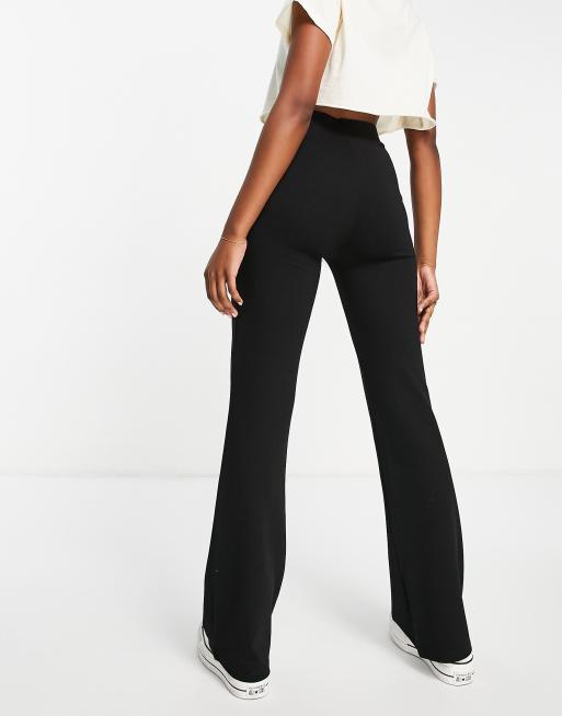 Bershka folded waistband flared pants in black