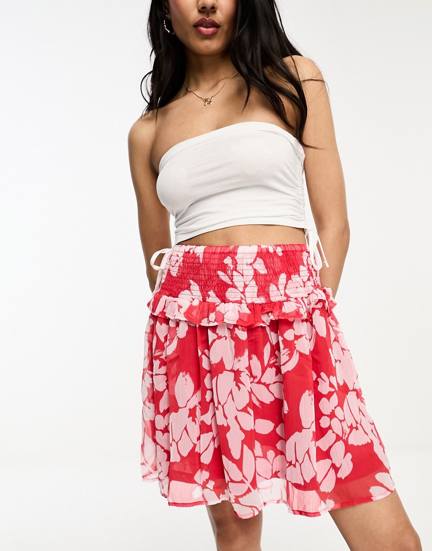JDY frill detail mini skirt in red and pink floral