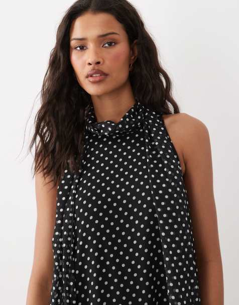 JDY – Gepunktetes Midikleid in Schwarz mit Neckholder-Träger - view 1