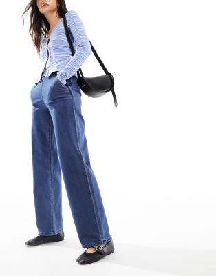 high waisted wide leg jeans in mid wash blue