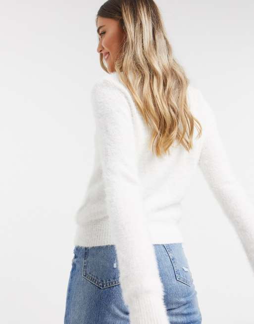 Fuzzy white jumper sale