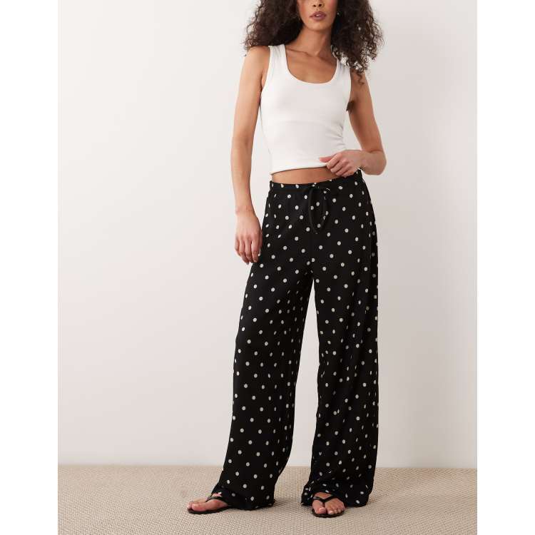 JDY loose fit textured pants in black polka dot | ASOS