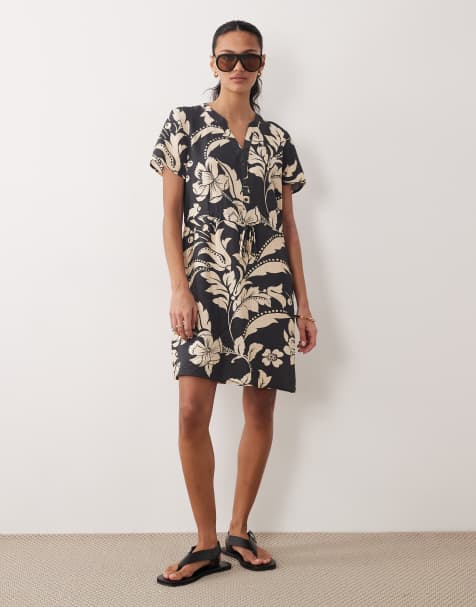 JDY - Mini jurk met V-hals en gestrikte taille in zwart met crèmekleurige bloemenprint - view 1