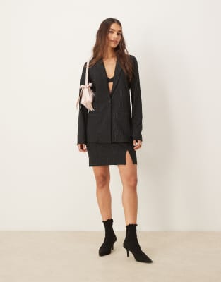 notch front mini skirt in black - part of a set