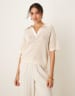 ASOS DESIGN Tall cheesecloth pull on pants with raw edge in buttermilk