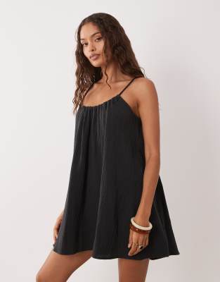 JDY Petite cheesecloth sleeveless mini dress in washed black