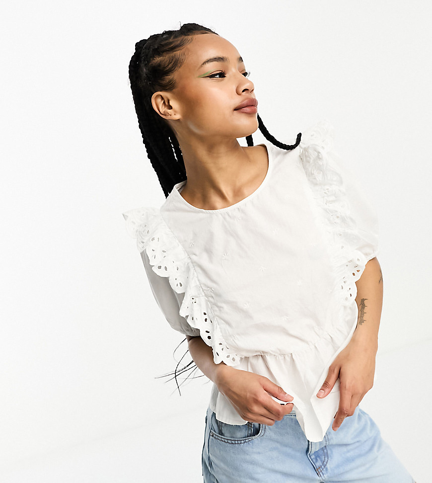 eyelet peplum blouse with frill detailing in white