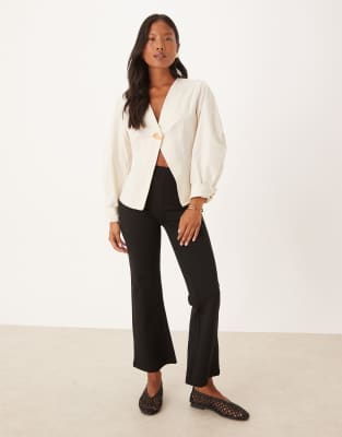 JDY Petite JDY Petite high waisted flared trousers in black