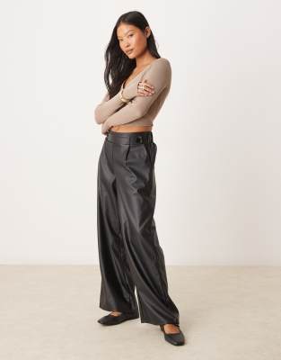 JDY Petite JDY Petite high waisted wide leg faux leather trousers in black