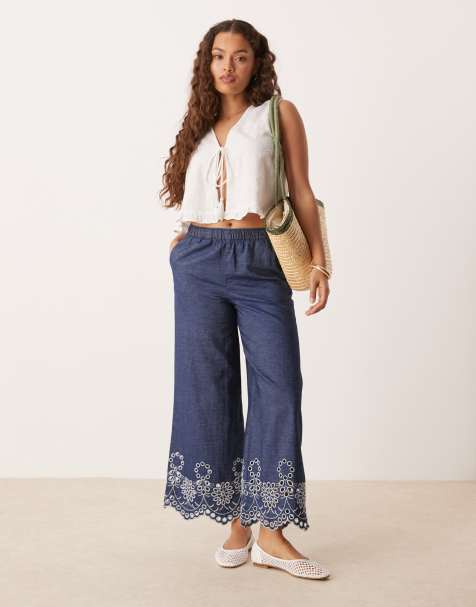 JDY Petite embroidery detail cropped trousers in mid blue wash 