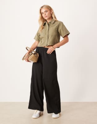 JDY Petite JDY Petite textured wide leg trousers in black
