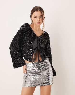 JDY reversible sequin top with bow detail in black