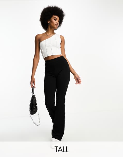 JDY Tall high waisted flared trousers in black - view 1
