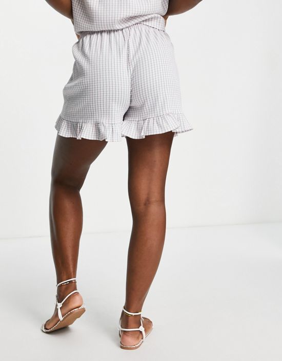 https://images.asos-media.com/products/jdy-textured-ruffle-shorts-in-cream-check-part-of-a-set/202727495-2?$n_550w$&wid=550&fit=constrain