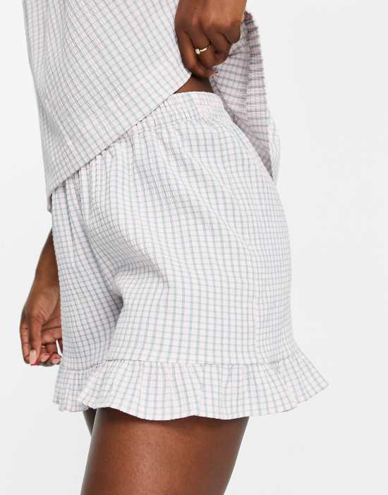 https://images.asos-media.com/products/jdy-textured-ruffle-shorts-in-cream-check-part-of-a-set/202727495-3?$n_550w$&wid=550&fit=constrain