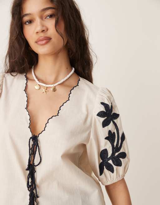 JDY tie front blouse with blue embroidery details