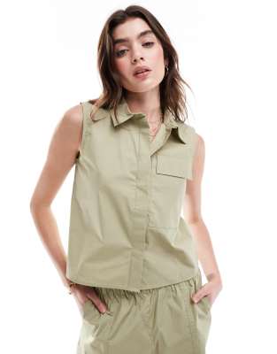 JDY utility singlet in sage green (part of a set)
