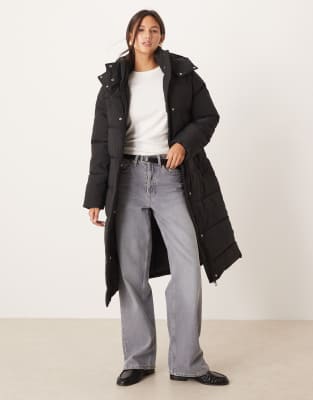 JDY - Wattierte Longline-Jacke in Schwarz