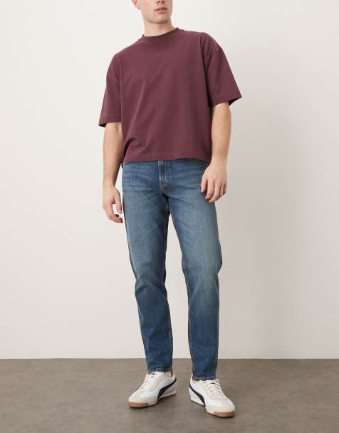 Jeans med tilspidsede ben i mørkvasket blå fra ASOS DESIGN - view 1