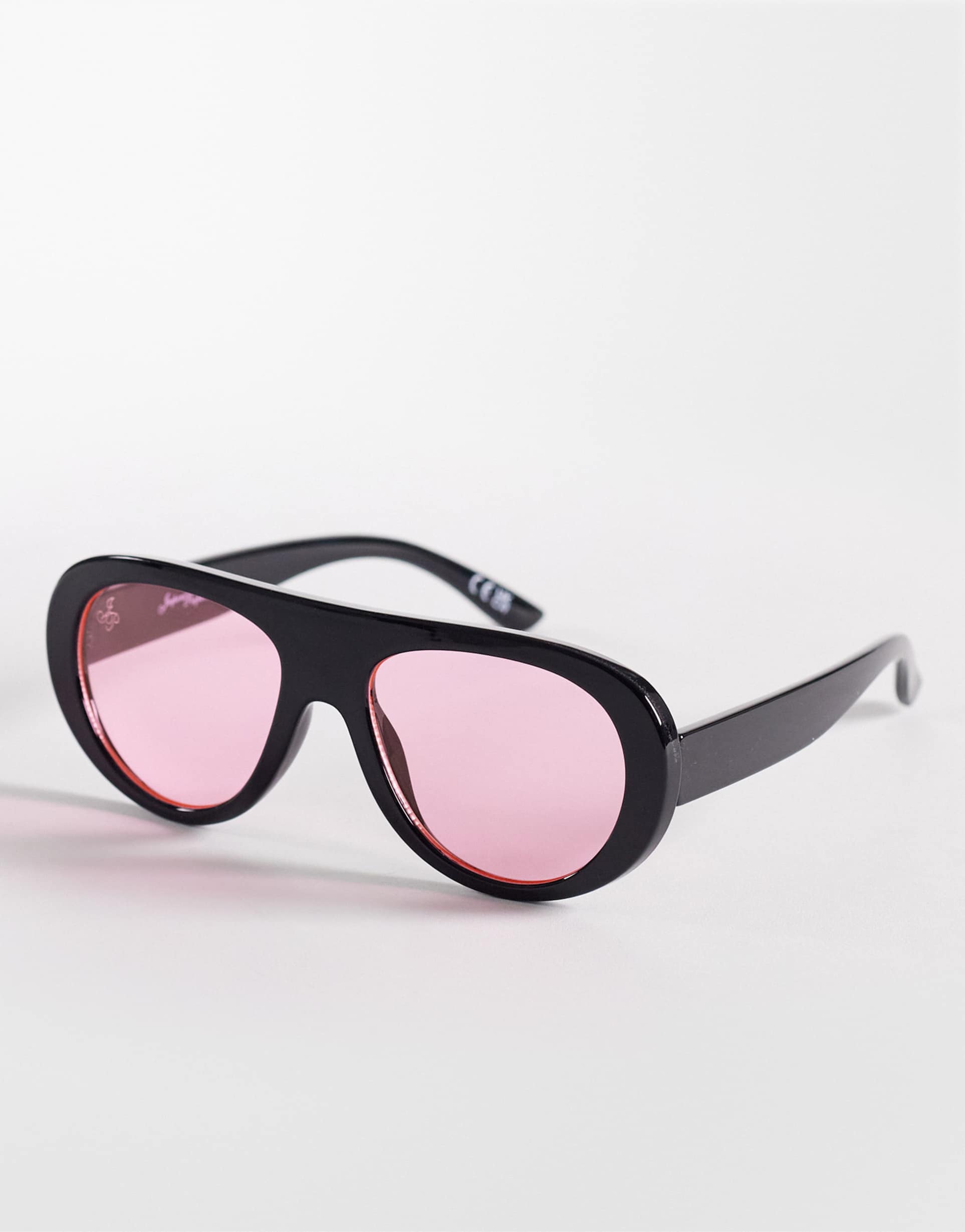 jeepers peepers flat top round sunglasses in black with pink lenses